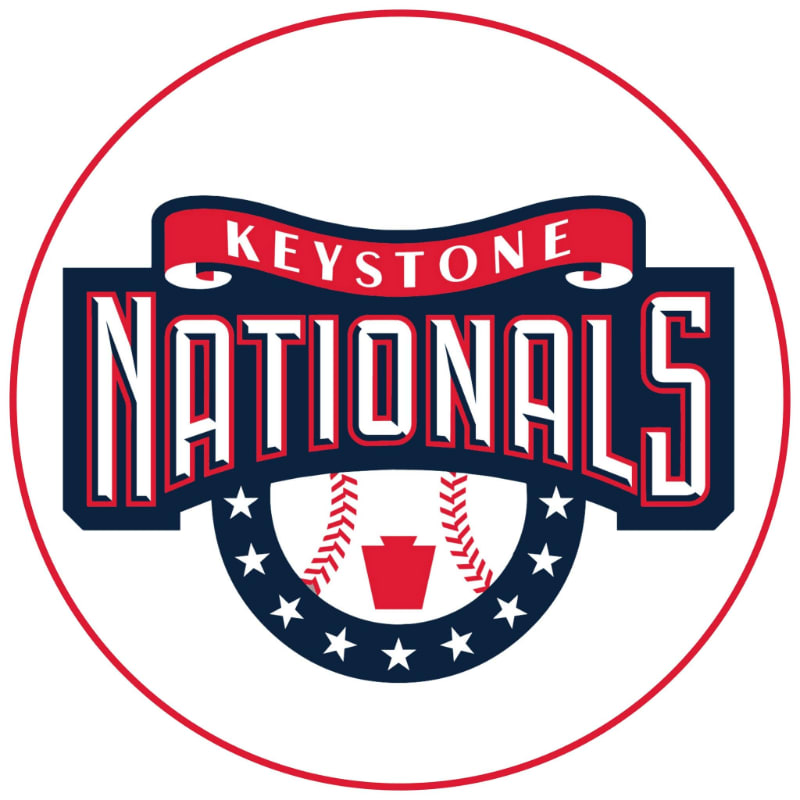 A red, white, and blue "Keystone Nationals" baseball logo is centered within a white circular border.