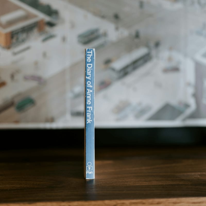a close up of a tube of toothpaste on a table