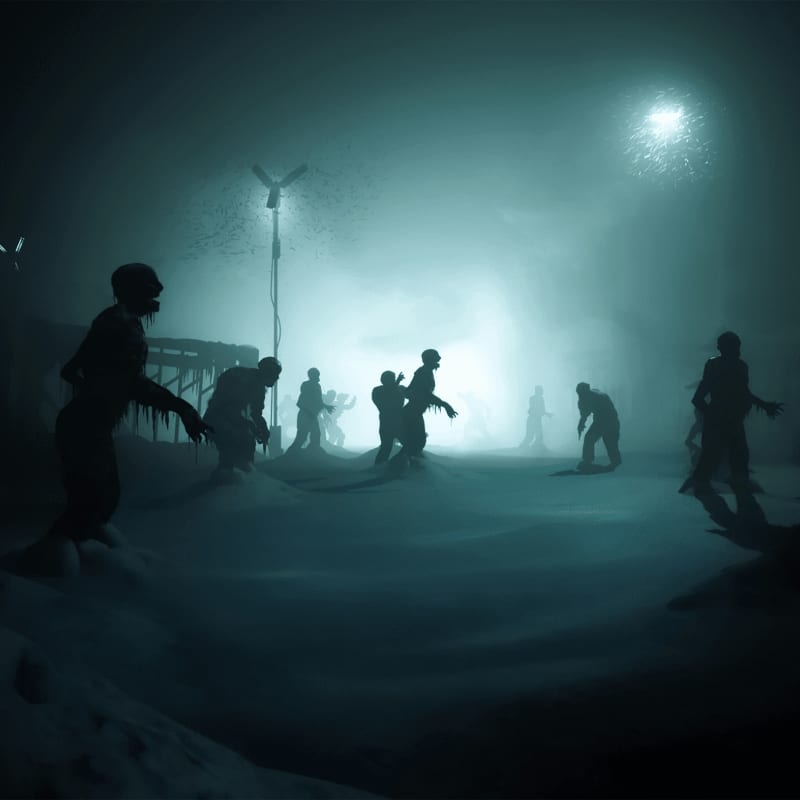 a group of people standing in the snow at night