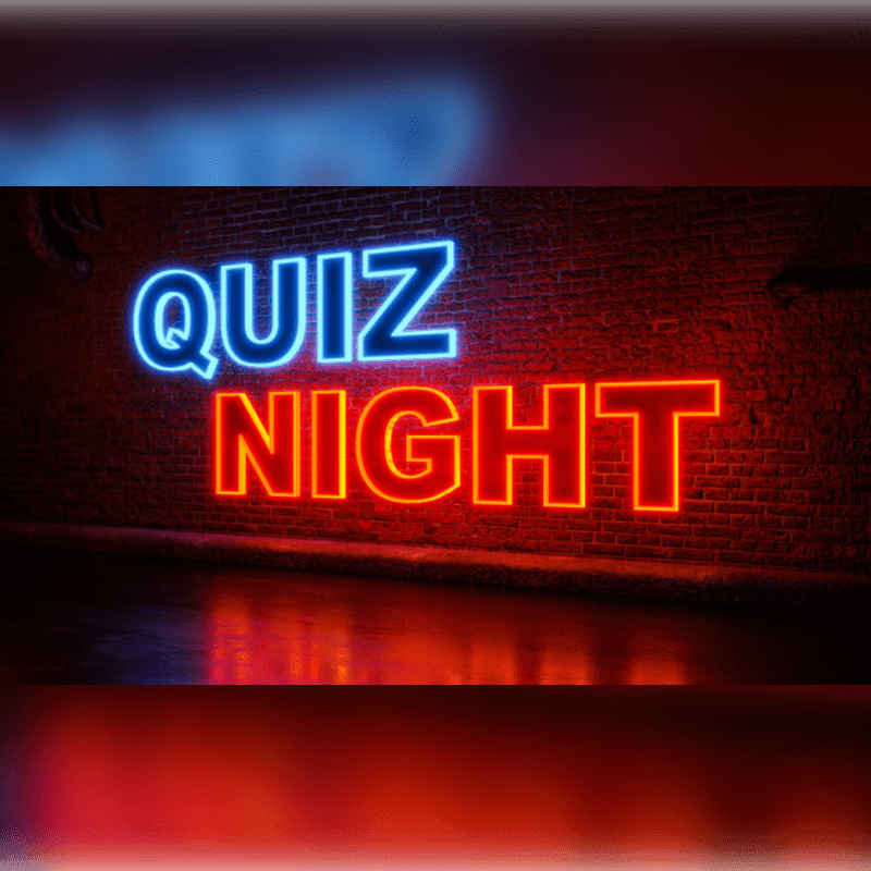 A blue and red neon "QUIZ NIGHT" sign glows against a dark brick wall with a reflective floor in the foreground.