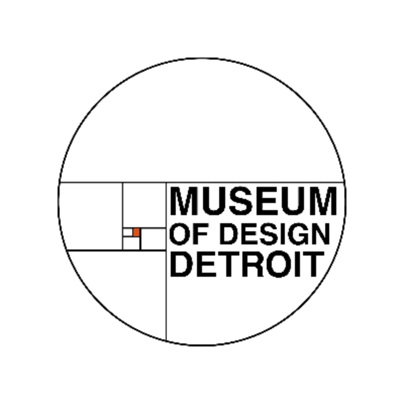 A circular logo containing a golden ratio spiral and the text "MUSEUM OF DESIGN DETROIT" is centered on a plain white background.
