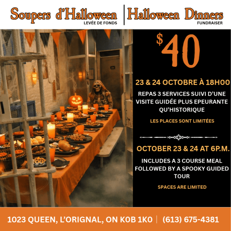 A spooky Halloween dinner table set with orange linens and themed food sits in the foreground, while a skeleton figure and a dim, atmospheric room form the background.