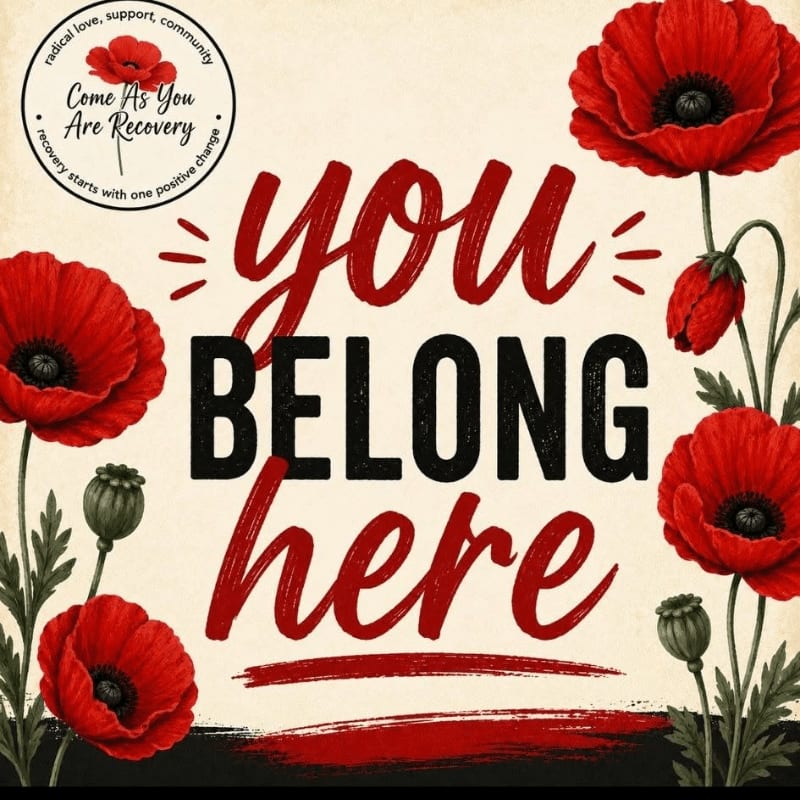 The words "you BELONG here" are centered in red and black text, surrounded by red poppies and a circular logo against a cream-colored background.