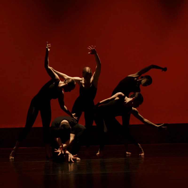 group of people performing on stage