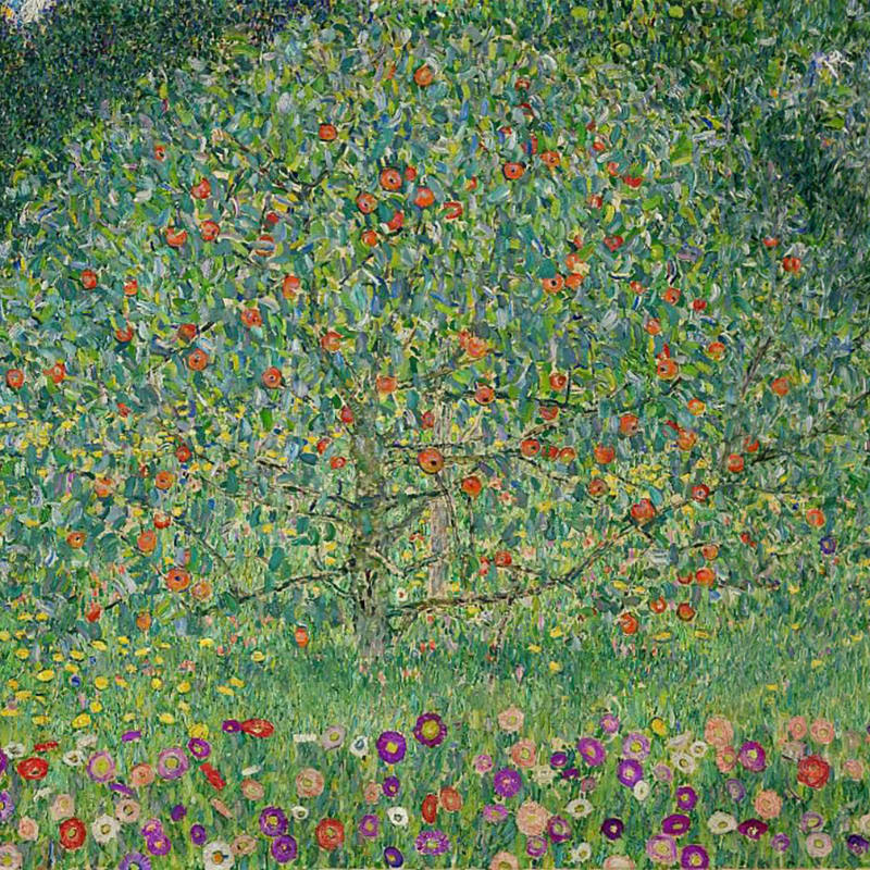 A colorful field of wildflowers fills the foreground beneath a large, fruit-bearing tree set against a dense green forest background.