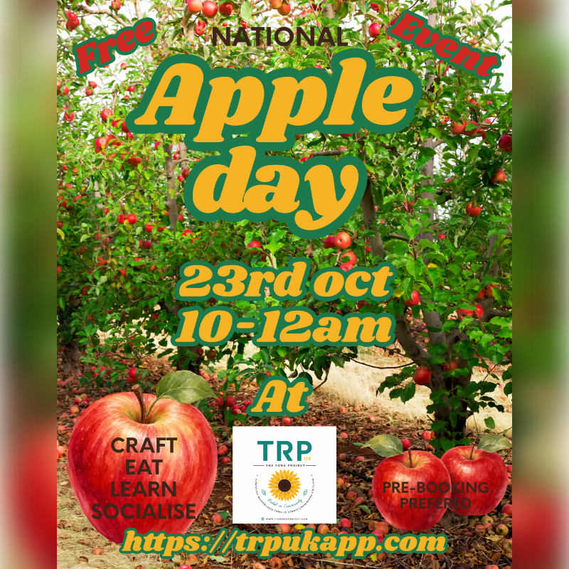 Bright yellow and green text advertising "National Apple Day" is overlaid on a background of apple trees, with large red apples resting in the foreground.