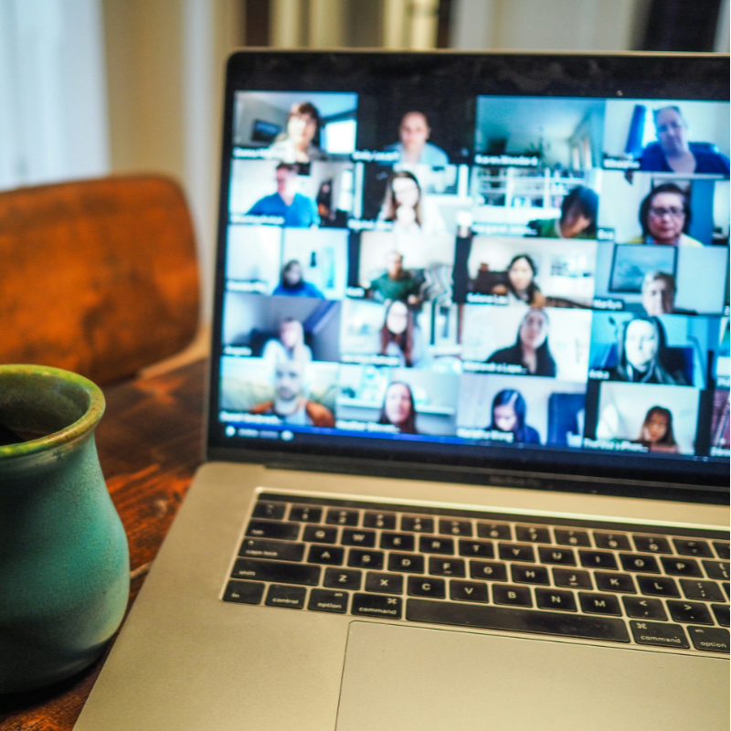 macbook pro displaying group of people