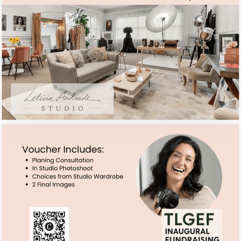 A photography studio interior with a grey sofa and lighting equipment is positioned above a promotional voucher featuring a smiling woman holding a camera.