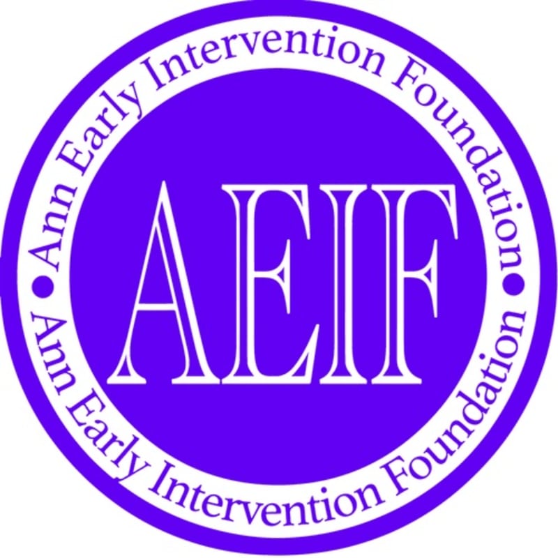 White "AEIF" lettering sits in the center of a purple circle, surrounded by a white border containing the text "Ann Early Intervention Foundation."