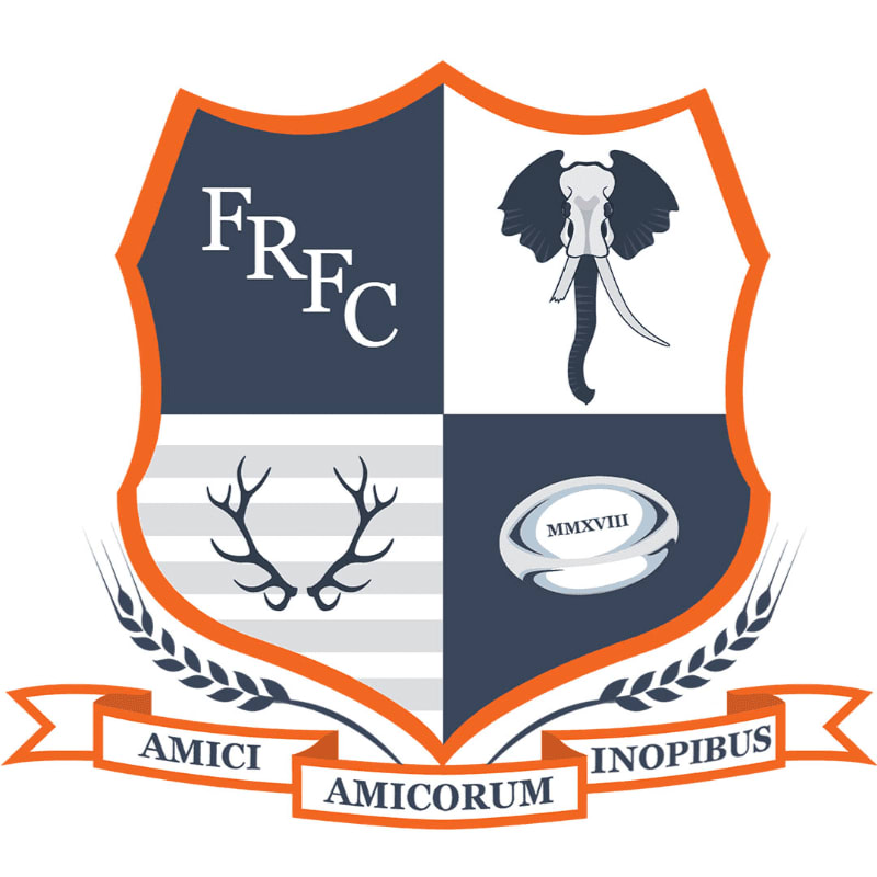 A quarterly shield featuring the letters "FRFC", an elephant, antlers, and a rugby ball sits above a Latin motto ribbon against a plain white background.
