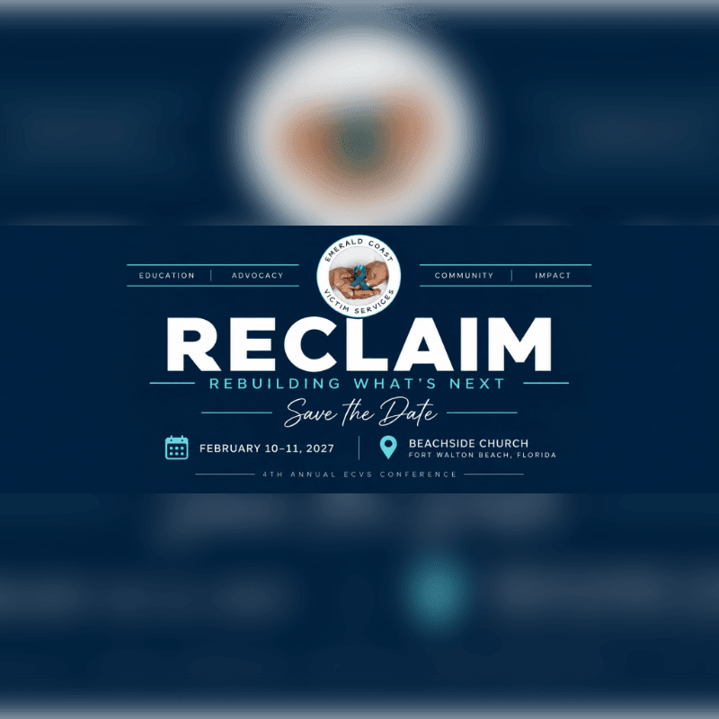 A white and blue event flyer for the "RECLAIM" conference is centered against a blurred, dark blue background.