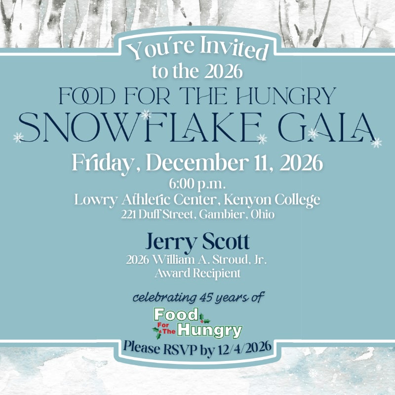 An invitation for the 2026 Food for the Hungry Snowflake Gala is centered in the foreground against a background of snowy birch trees.