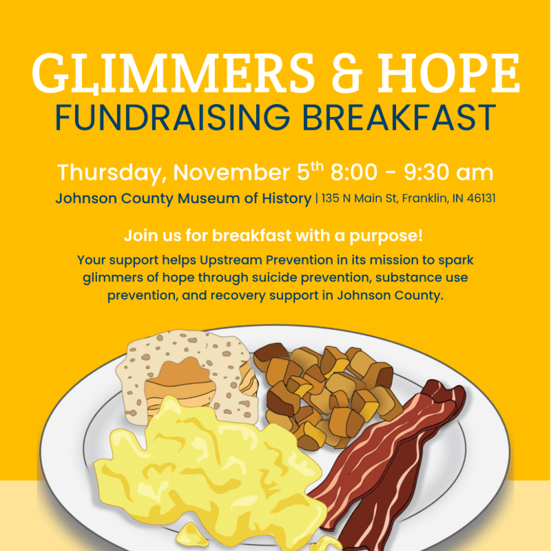 A plate of breakfast food featuring eggs, bacon, potatoes, and toast sits in the foreground against a yellow background with event text.