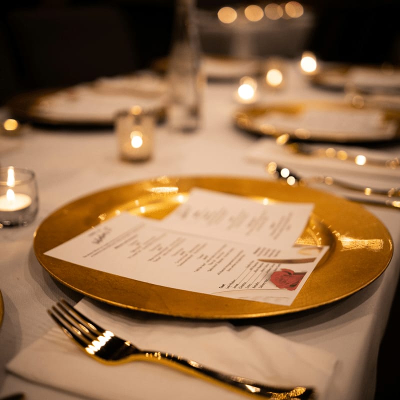 stainless steel fork and knife on white ceramic plate