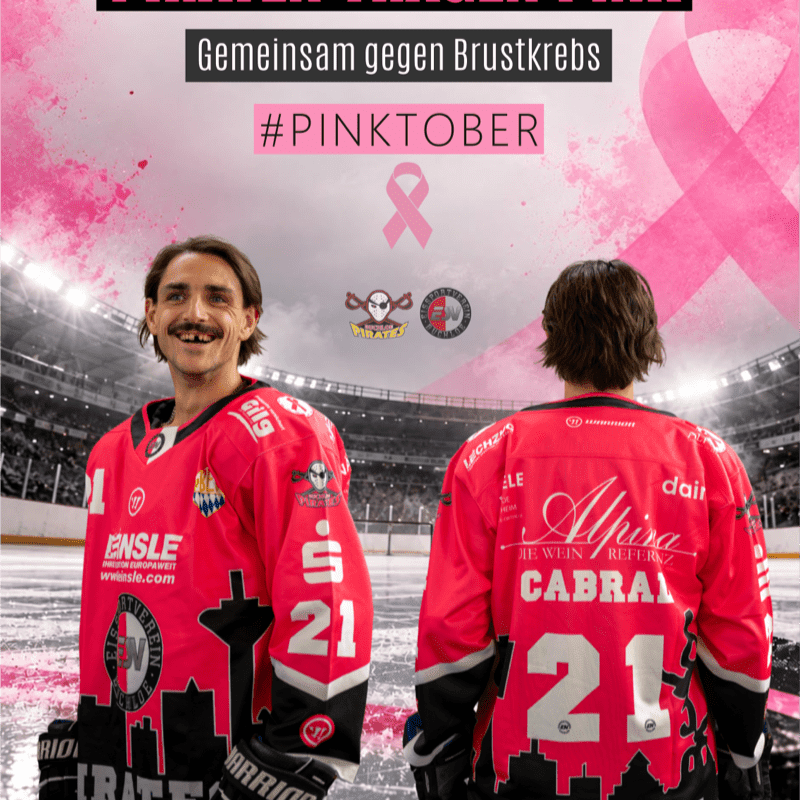 Two hockey players in pink jerseys stand in a stadium foreground against a background featuring a large pink ribbon and breast cancer awareness text.