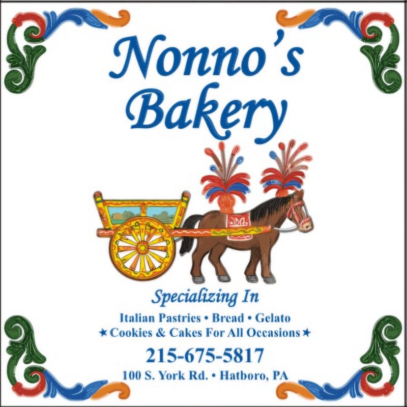 A colorful horse-drawn carriage is centered against a white background featuring the blue text "Nonno's Bakery" and contact information, all framed by decorative floral corners.
