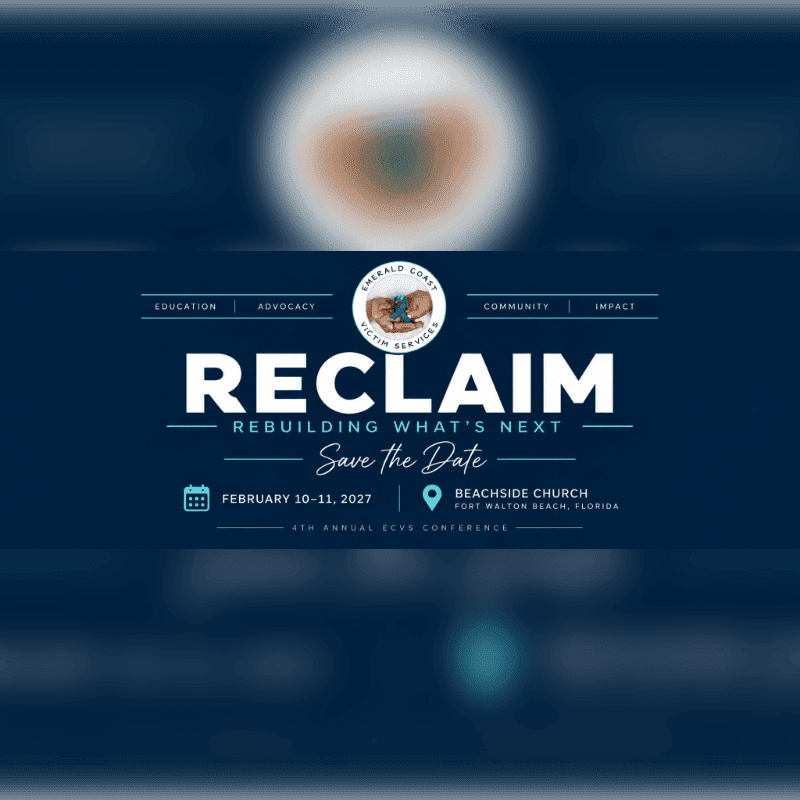 A white and blue event flyer for the "RECLAIM" conference is centered against a blurred, dark blue background.