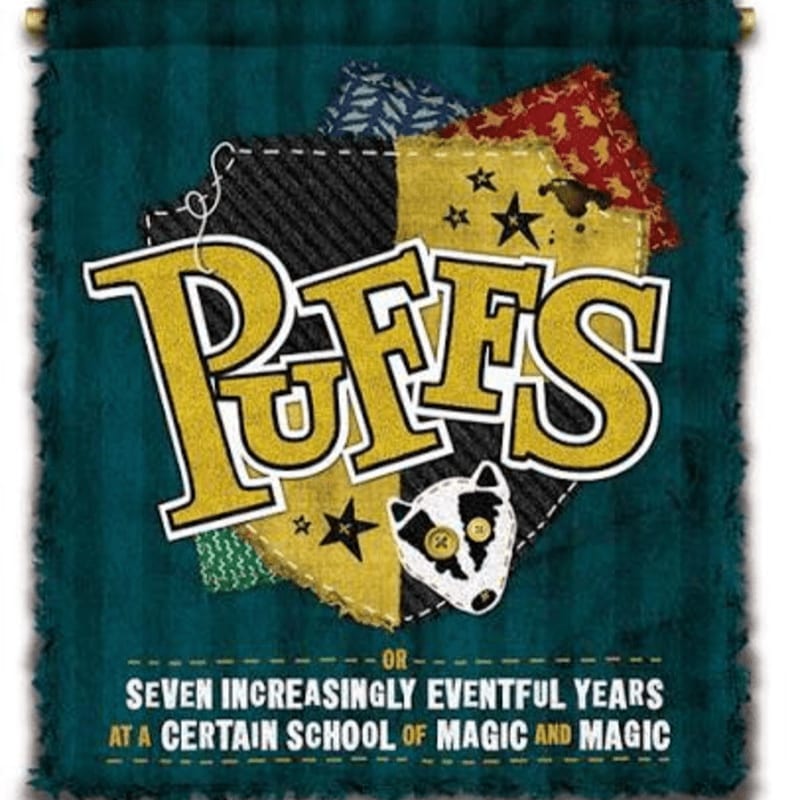 The word "PUFFS" is written in large yellow letters over a patchwork crest, all set against a dark teal fabric banner.