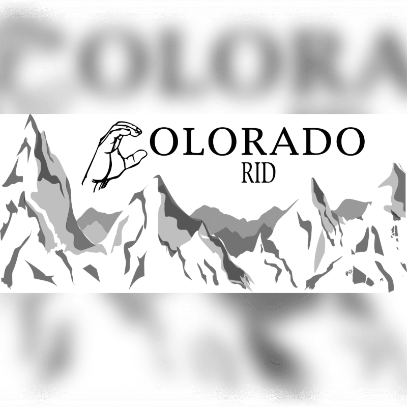 A hand and the text "COLORADO RID" are positioned above a range of jagged mountains against a blurred white and grey background.