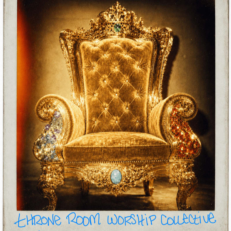 An ornate gold throne with jeweled armrests sits centered against a dark, moody background.