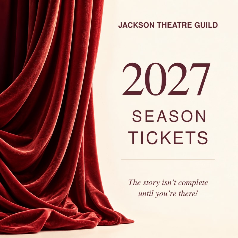 A red velvet curtain drapes across the left foreground against a plain white background featuring text for Jackson Theatre Guild 2027 season tickets.