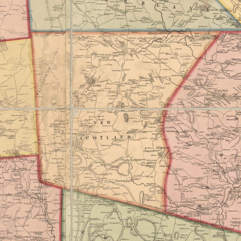 An antique map features detailed topographical markings and town names in the foreground, set against a background of colored regional borders and faded parchment.