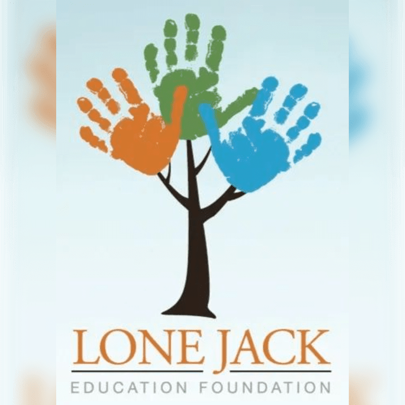 A logo featuring a brown tree trunk with orange, green, and blue handprints as leaves set against a light blue background with the text "LONE JACK EDUCATION FOUNDATION" below.