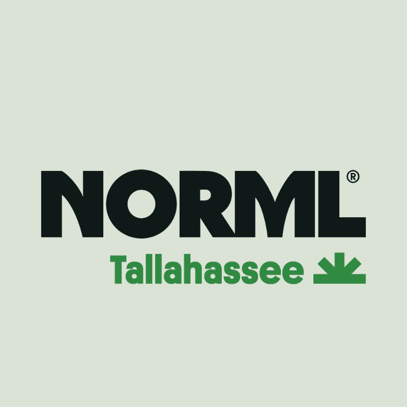 Bold black letters spelling "NORML" are in the foreground against a pale green background, with "Tallahassee" and a green cannabis leaf symbol below it.