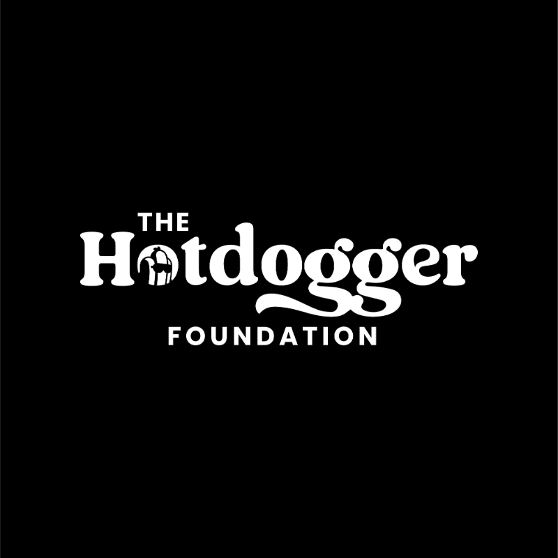 White text reading "THE Hotdogger FOUNDATION" is centered against a solid black background.