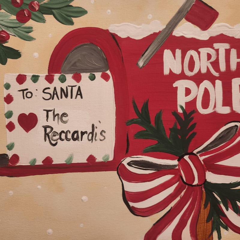 A red North Pole mailbox with a letter to Santa and a striped bow sits against a light beige background with holly leaves.