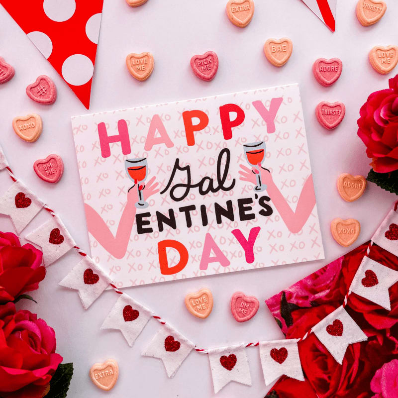 Happy galentine's day card with candy hearts and roses