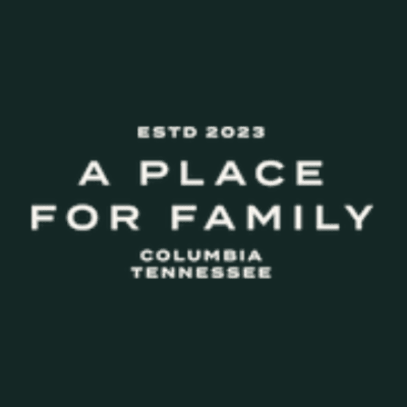 White text reading "ESTD 2023 A PLACE FOR FAMILY COLUMBIA TENNESSEE" is centered against a dark green background.