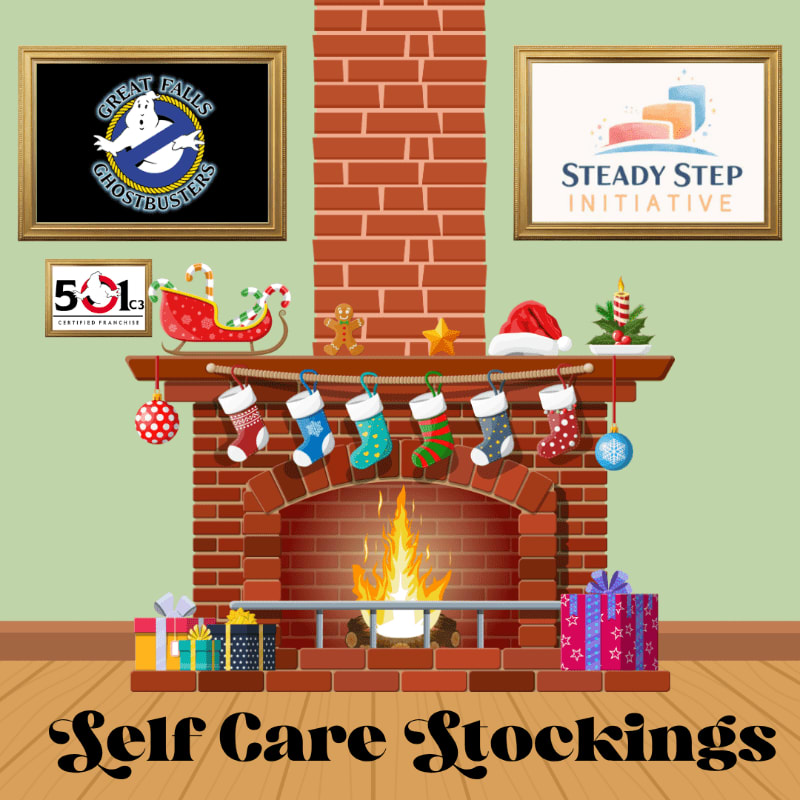 Colorful Christmas stockings hang from a fireplace mantel in a room featuring a brick chimney and framed logos on the walls.