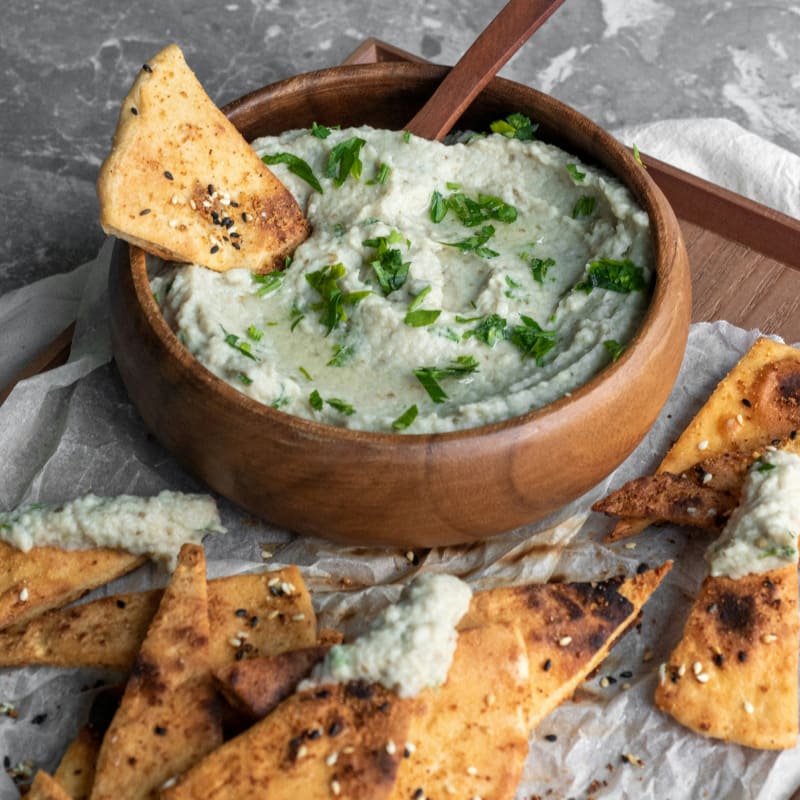 green soup on brown wooden bowl