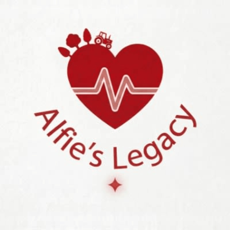 A red heart with a heartbeat line and a small tractor on top sits above the text "Alfie's Legacy" against a plain white background.