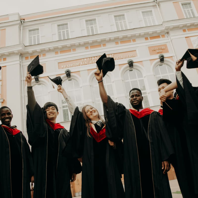 group of people wearing black academic dress
