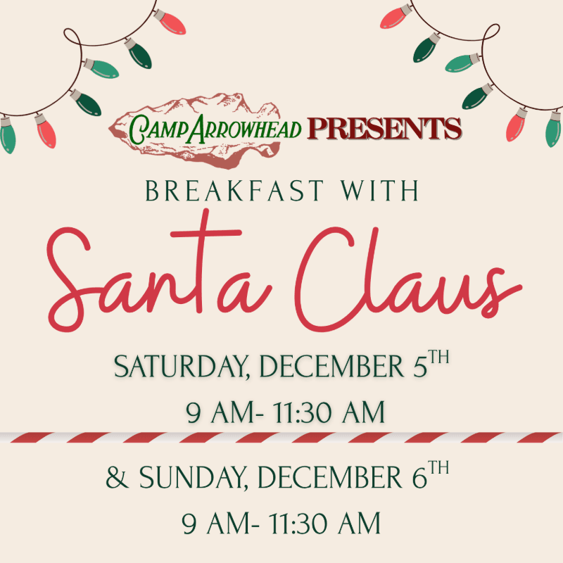 Red and green Christmas lights frame the top of a cream-colored background featuring text for a "Breakfast with Santa Claus" event.