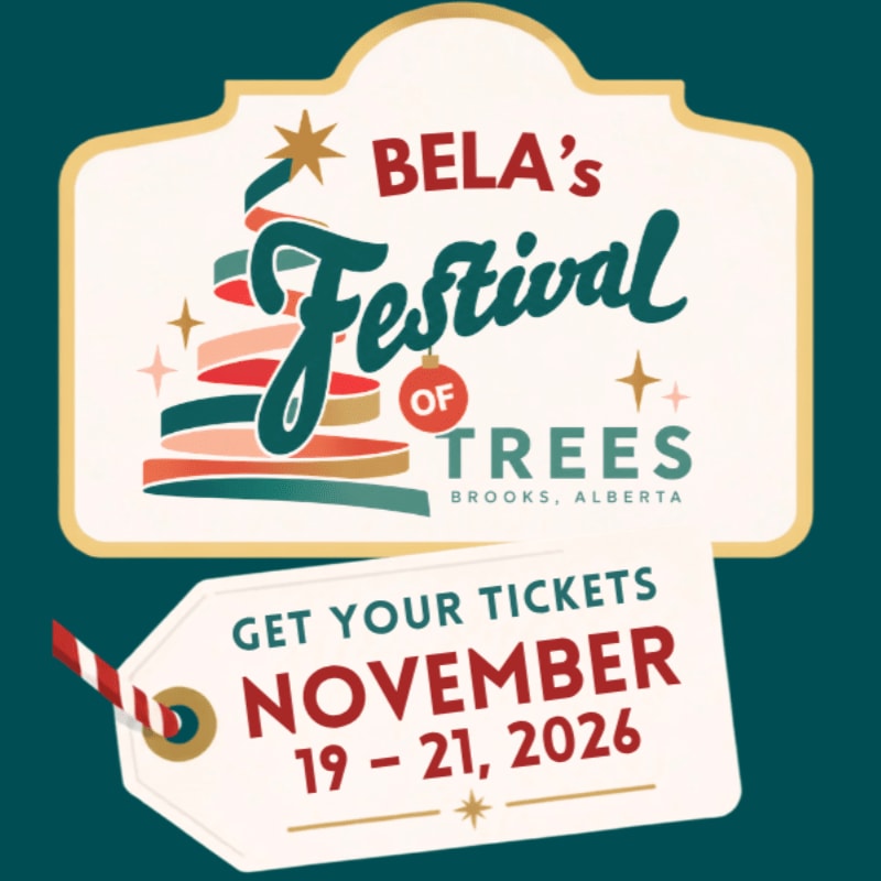 A white ticket and a decorative sign advertising "Bela's Festival of Trees" in Brooks, Alberta, are set against a dark green background.