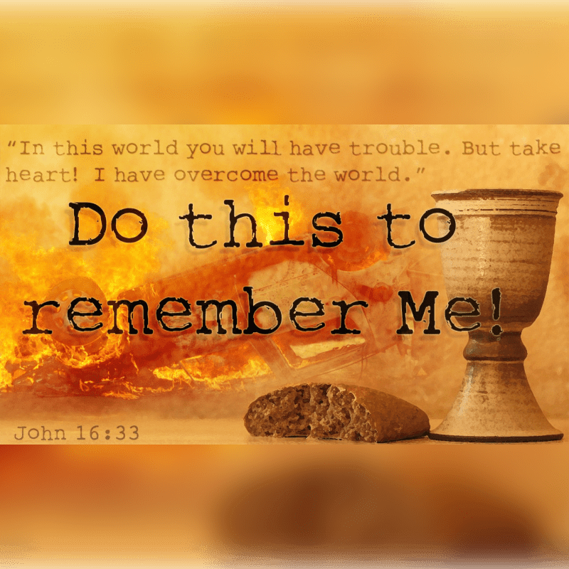 A chalice and a piece of broken bread sit in the foreground against a background of flames and biblical text.
