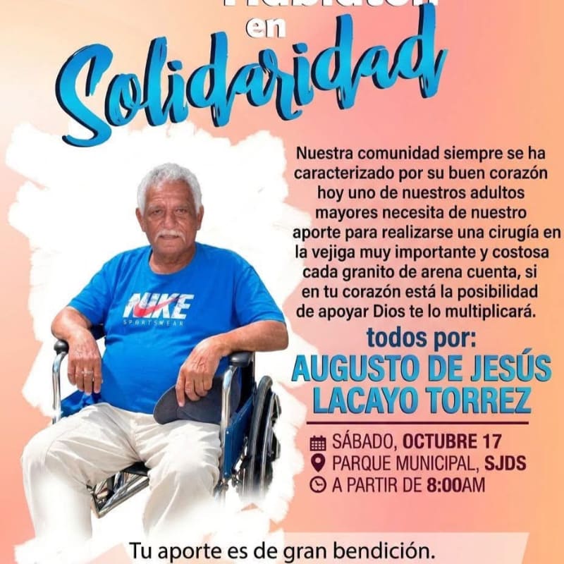 An elderly man in a blue Nike shirt and wheelchair sits in the foreground against a pink background featuring blue cursive text and a Spanish fundraising appeal.