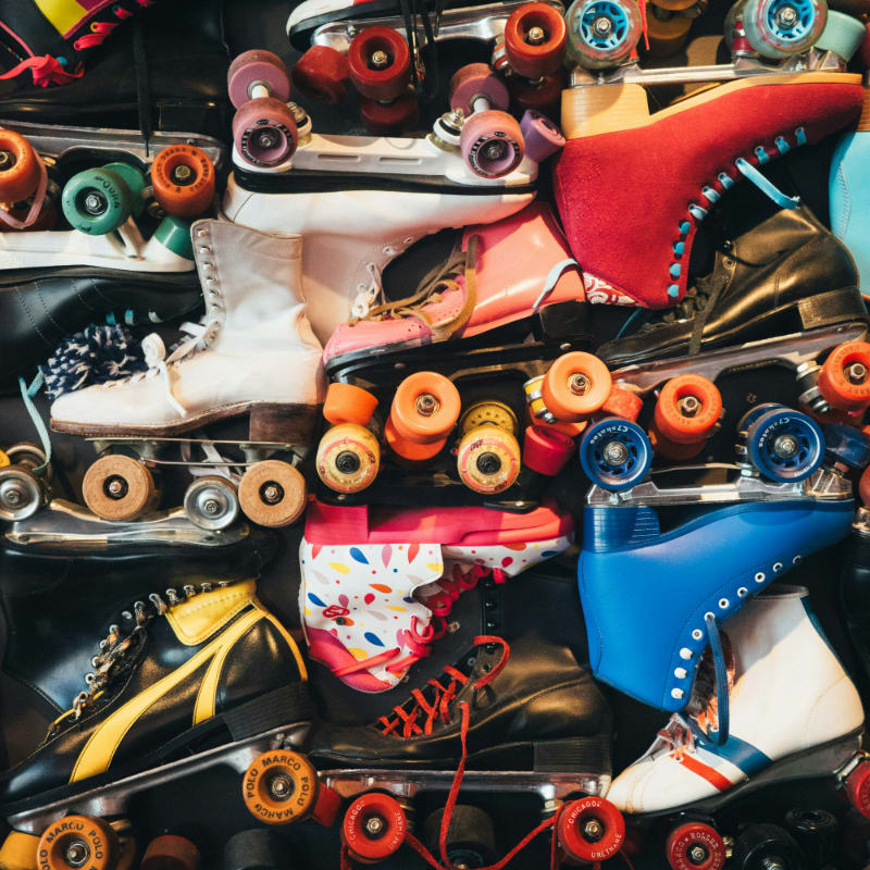 Assortment of colorful roller skates displayed