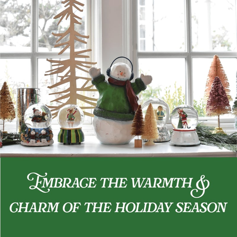 A collection of festive holiday decorations, including a snowman and snow globes, sits on a windowsill against a bright window background with a green text banner below.