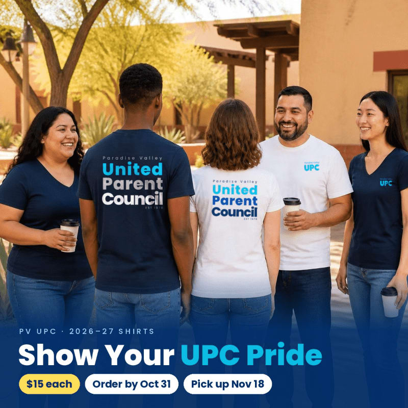Five people wearing "United Parent Council" t-shirts stand and talk in the foreground against a background of sunny trees and a building.