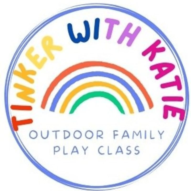 A colorful rainbow and the text "Tinker with Katie Outdoor Family Play Class" are centered within a blue circular border on a plain white background.