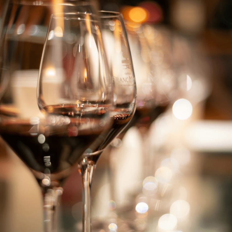 clear wine glass with red wine