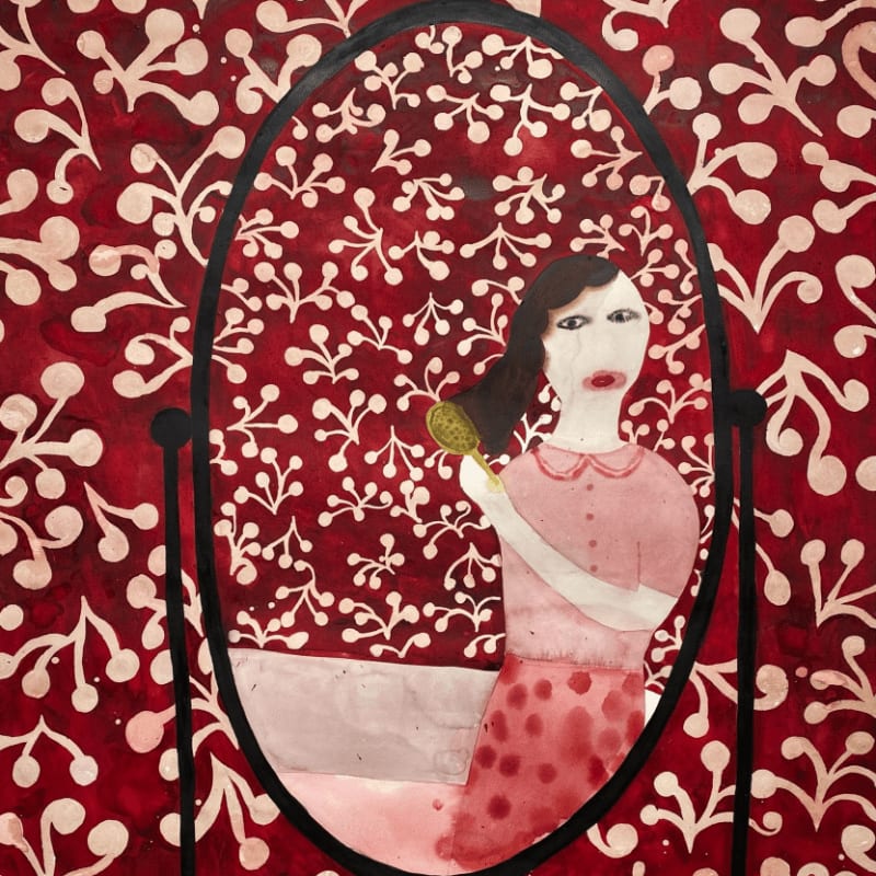 A woman with dark hair holding a mirror is framed within an oval border against a red and white floral pattern background.