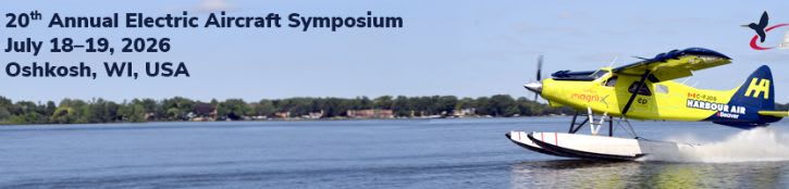 A yellow seaplane speeds across the water in the foreground, with a tree-lined shore and text about an electric aircraft symposium in the background.
