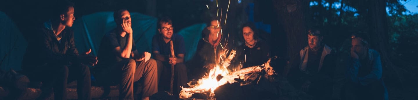 people having a bonfire