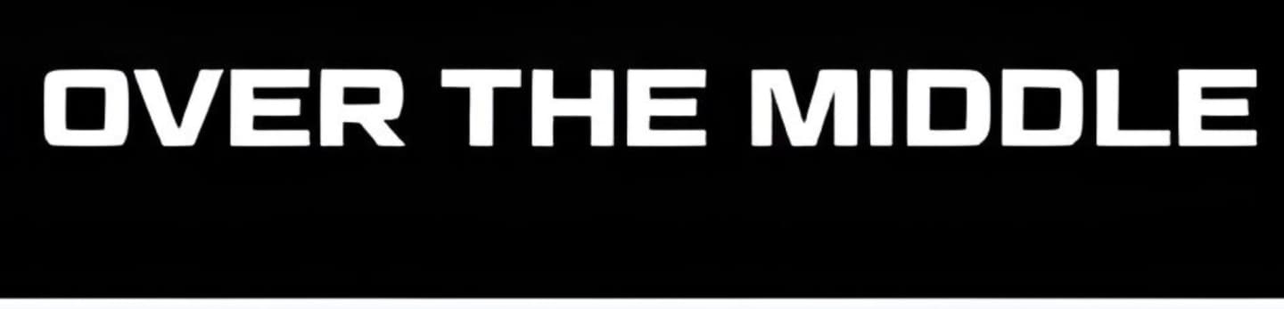 White text reading "OVER THE MIDDLE" is centered on a black background.
