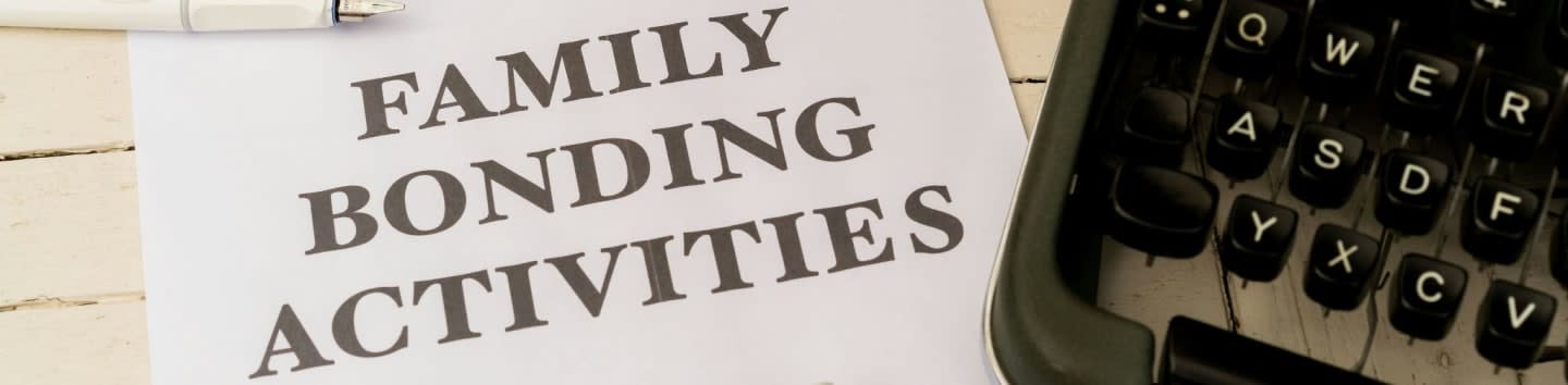 a family bonding activity on a piece of paper next to a typewriter
